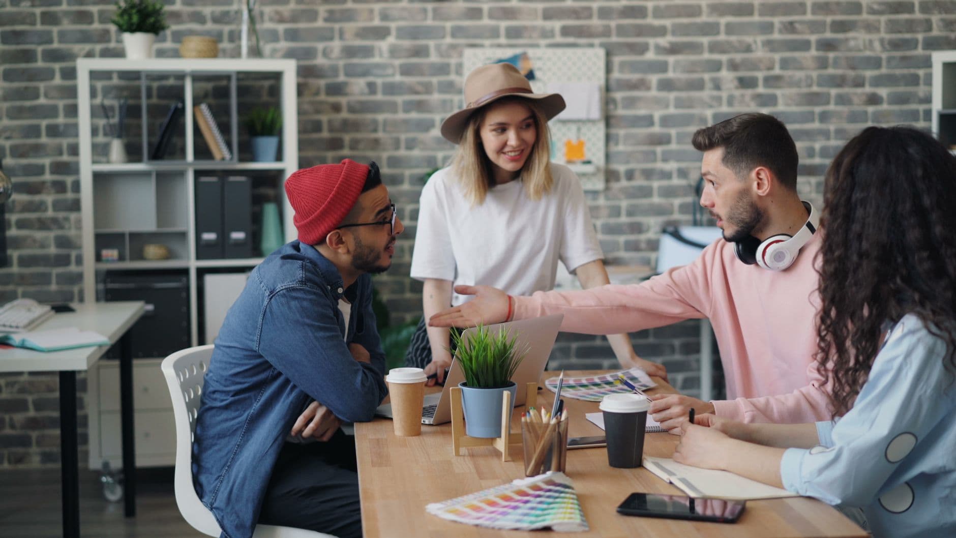 A group of young professionals brainstorming ideas together